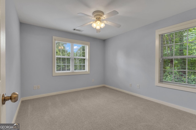 14 Hammock Ridge Dr, Newnan, GA 30265 - carpeted empty room with ceiling fan and baseboards