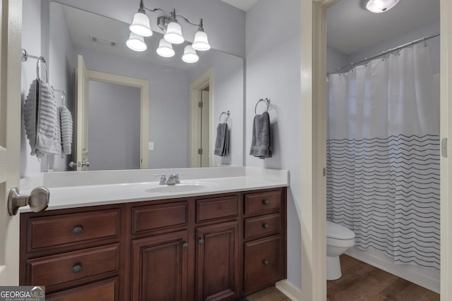 14 Hammock Ridge Dr, Newnan, GA 30265 - bathroom with vanity, wood finished floors, a shower with curtain, and a chandelier