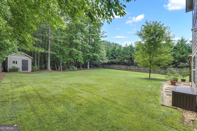 14 Hammock Ridge Dr, Newnan, GA 30265 - fenced backyard with a shed