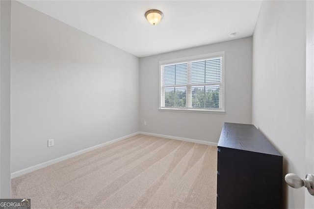 5504 Cameron Parc Dr, Johns Creek, GA 30022 - spare room with baseboards and light carpet