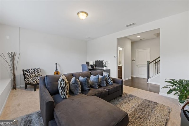 5504 Cameron Parc Dr, Johns Creek, GA 30022 - carpeted living room featuring a desk and stairs