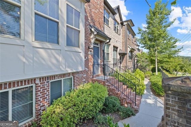 5504 Cameron Parc Dr, Johns Creek, GA 30022 - view of home's exterior featuring brick siding