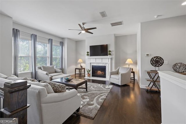 5504 Cameron Parc Dr, Johns Creek, GA 30022 - living room featuring a fireplace, dark wood-style flooring, and a ceiling fan