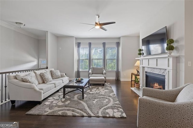 5504 Cameron Parc Dr, Johns Creek, GA 30022 - living room featuring ceiling fan, a premium fireplace, wood finished floors, and crown molding