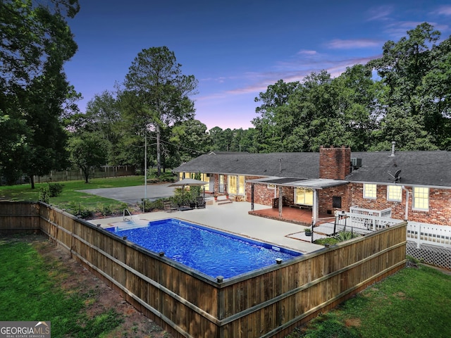 234 Crumbley Rd, Mcdonough, GA 30252 - view of pool featuring a patio and view of wooded area
