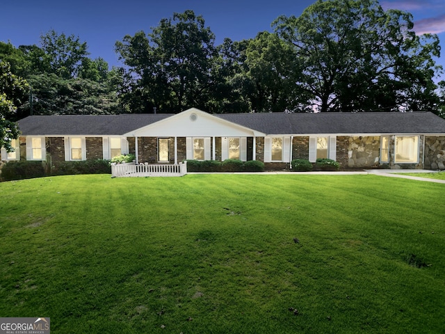 234 Crumbley Rd, Mcdonough, GA 30252 - ranch-style house with stone siding and a front yard