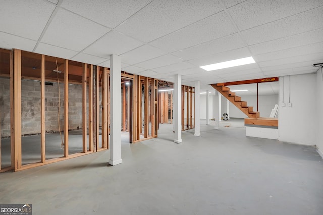 234 Crumbley Rd, Mcdonough, GA 30252 - below grade area featuring stairs and a drop ceiling