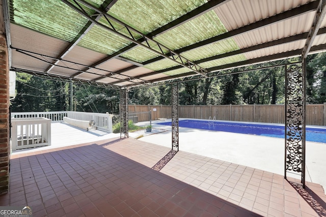 234 Crumbley Rd, Mcdonough, GA 30252 - view of swimming pool with a fenced backyard, a patio area, and view of wooded area