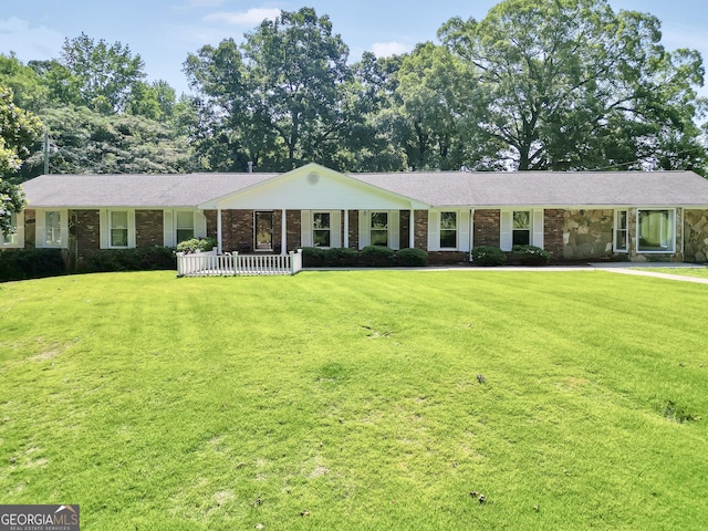 234 Crumbley Rd, Mcdonough, GA 30252 - single story home with a front lawn and covered porch