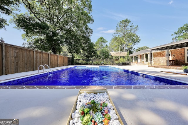 234 Crumbley Rd, Mcdonough, GA 30252 - view of pool featuring a patio