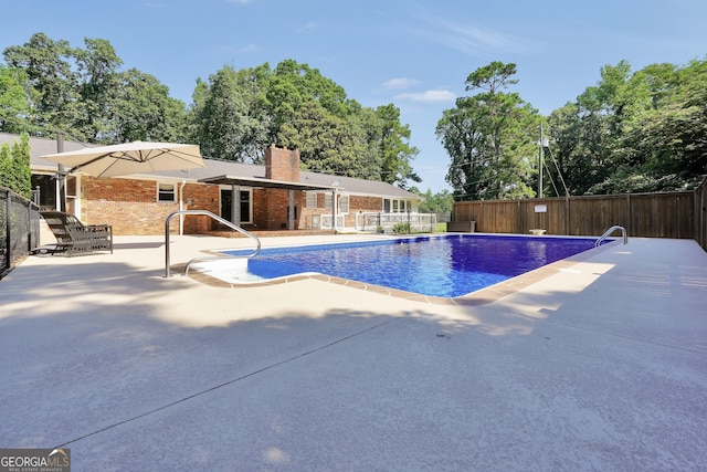 234 Crumbley Rd, Mcdonough, GA 30252 - view of swimming pool featuring a patio area