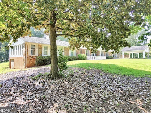 234 Crumbley Rd, Mcdonough, GA 30252 - view of front of home featuring stone siding and a front yard