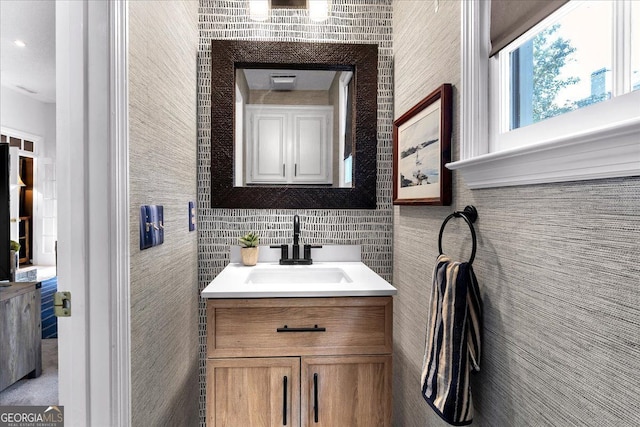 4385 Pinehollow Ct, Alpharetta, GA 30022 - bathroom featuring tile walls and vanity