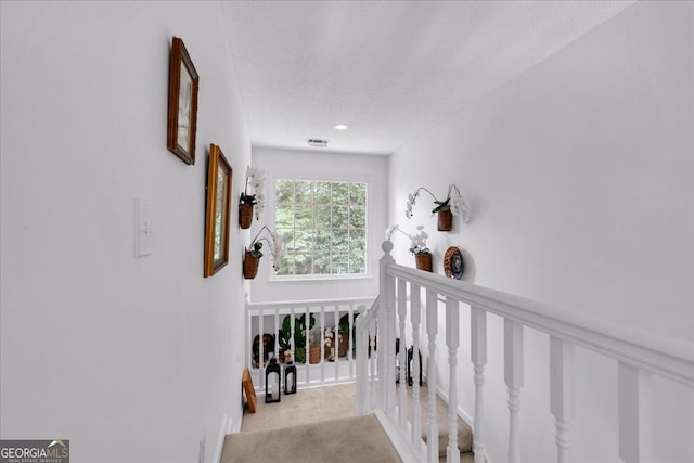 4385 Pinehollow Ct, Alpharetta, GA 30022 - stairs featuring carpet flooring and a textured ceiling
