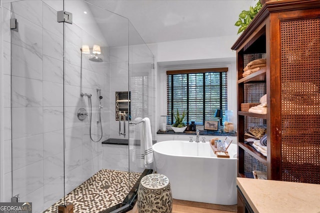 4385 Pinehollow Ct, Alpharetta, GA 30022 - full bath with a freestanding bath, a shower stall, and vaulted ceiling
