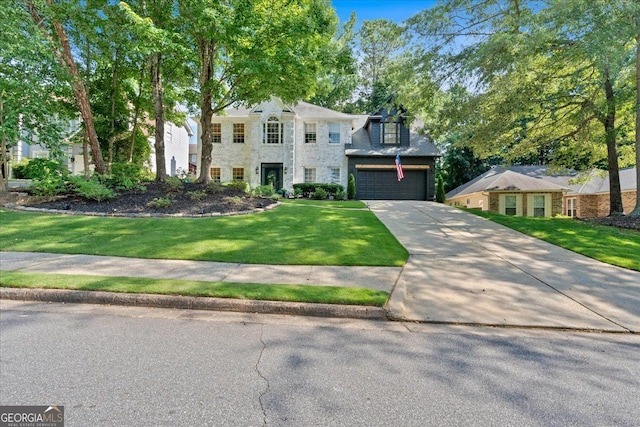 4385 Pinehollow Ct, Alpharetta, GA 30022 - colonial home with driveway, a front yard, a garage, and stone siding
