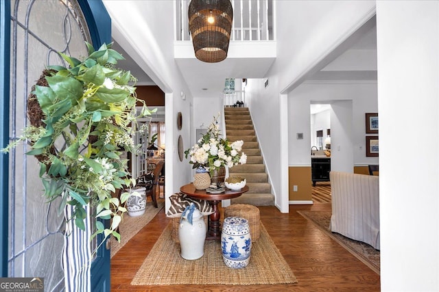 4385 Pinehollow Ct, Alpharetta, GA 30022 - entryway with stairway, wood finished floors, and a high ceiling