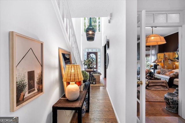 4385 Pinehollow Ct, Alpharetta, GA 30022 - hallway featuring wood-type flooring and a towering ceiling