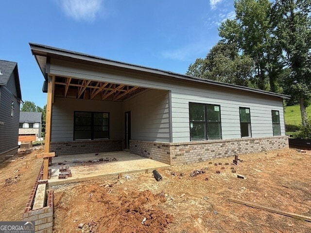 101 Everwood Ct, Dallas, GA 30132 - view of front of property featuring brick siding and a patio area