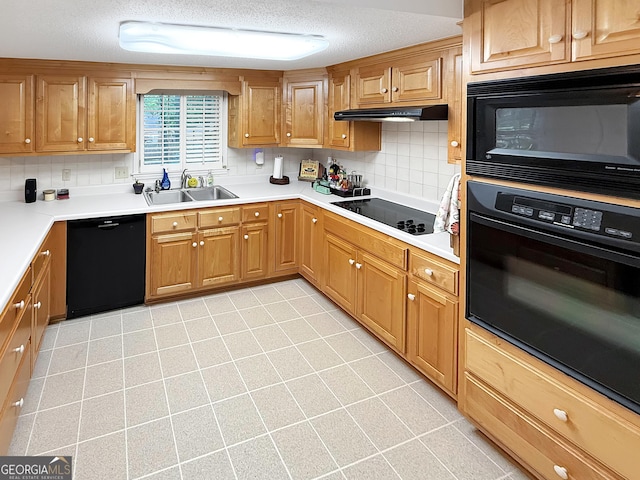 180 Broomsedge Trl, Athens, GA 30605 - kitchen with black appliances, under cabinet range hood, decorative backsplash, a textured ceiling, and light tile patterned floors