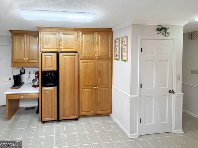 180 Broomsedge Trl, Athens, GA 30605 - kitchen with paneled built in fridge, light tile patterned floors, ornamental molding, and a textured ceiling