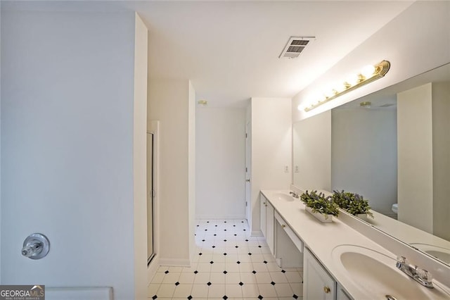 5176 Shotwell St, Woodstock, GA 30188 - full bathroom featuring double vanity, a shower with door, and tile patterned floors