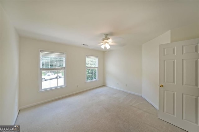 5176 Shotwell St, Woodstock, GA 30188 - empty room with light carpet and a ceiling fan