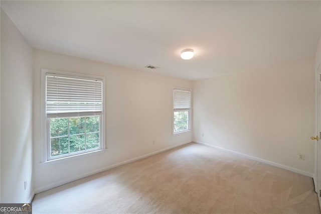 5176 Shotwell St, Woodstock, GA 30188 - unfurnished room with baseboards and light carpet