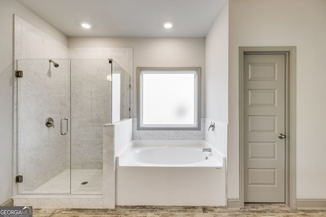 32 Sourwood Dr, Mansfield, GA 30055 - bathroom featuring a garden tub and a stall shower