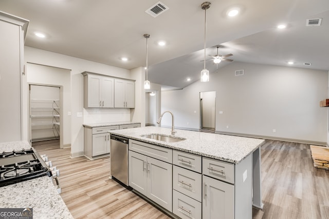 32 Sourwood Dr, Mansfield, GA 30055 - kitchen with dishwasher, ceiling fan, gray cabinets, gas range oven, and light wood-style floors