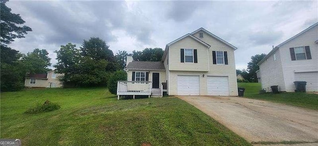 341 Brookside Dr, Mcdonough, GA 30253 - view of front facade featuring a garage, driveway, a front lawn, a deck, and a chimney