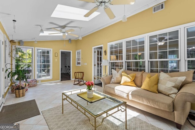 4961 Thornwood Trce NW, Acworth, GA 30102 - sunroom featuring a skylight, tile patterned flooring, ornamental molding, and vaulted ceiling