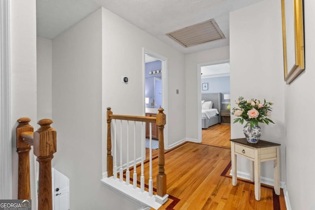 4961 Thornwood Trce NW, Acworth, GA 30102 - corridor with an upstairs landing and light wood finished floors