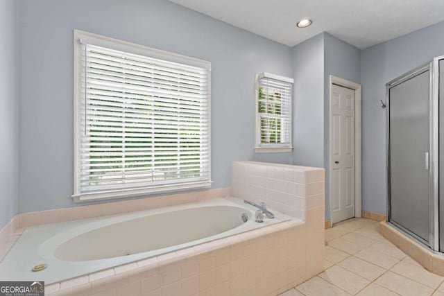 4961 Thornwood Trce NW, Acworth, GA 30102 - bathroom with a garden tub, plenty of natural light, tile patterned flooring, a stall shower, and recessed lighting