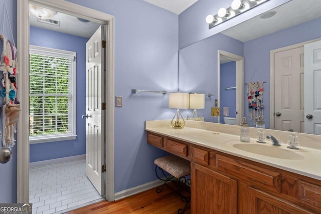 4961 Thornwood Trce NW, Acworth, GA 30102 - bathroom with baseboards and vanity