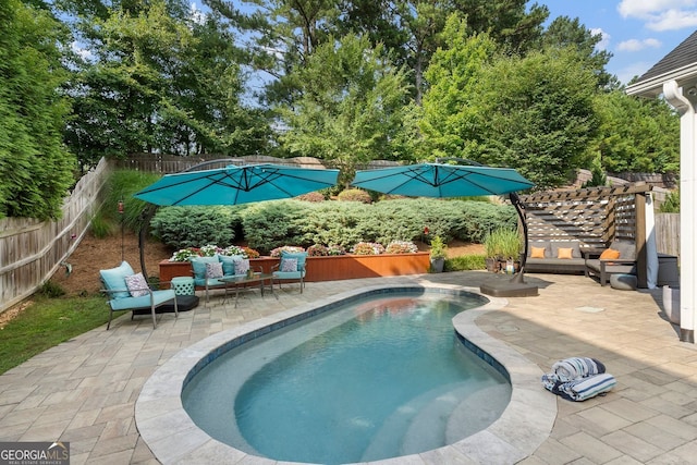 6430 Banbury Ct SE, Mableton, GA 30126 - view of swimming pool with a patio, a fenced backyard, and an outdoor hangout area