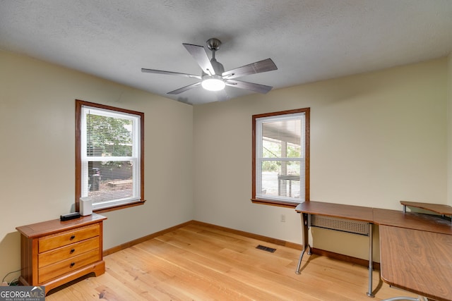 220 Gamble Dr, Carrollton, GA 30116 - unfurnished office featuring light wood-style floors, a ceiling fan, and a textured ceiling