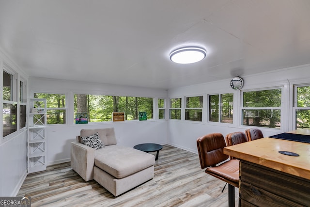 220 Gamble Dr, Carrollton, GA 30116 - sunroom / solarium with healthy amount of natural light, wood finished floors, and a wooden deck