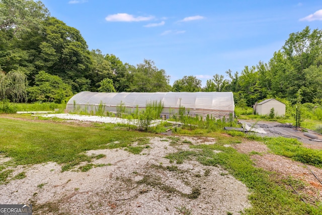 220 Gamble Dr, Carrollton, GA 30116 - view of yard with an exterior structure and an outdoor structure