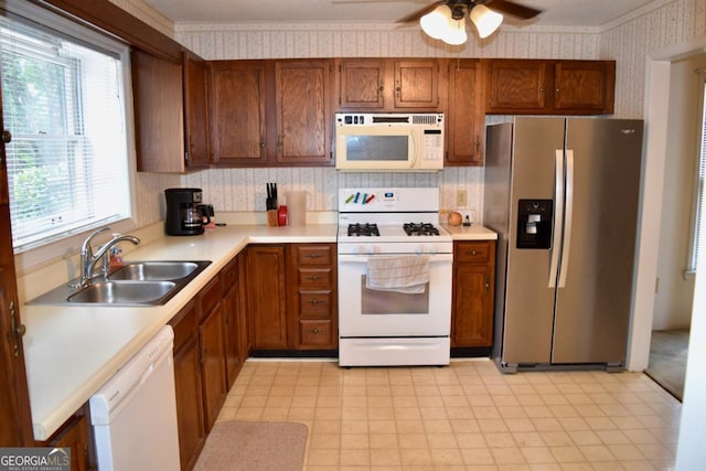 1106 Shiloh Ln NW, Kennesaw, GA 30144 - kitchen featuring white appliances, wallpapered walls, light countertops, a ceiling fan, and brown cabinetry