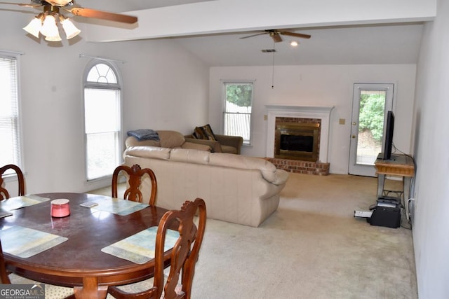 1106 Shiloh Ln NW, Kennesaw, GA 30144 - dining room with a ceiling fan, lofted ceiling, carpet, and a fireplace