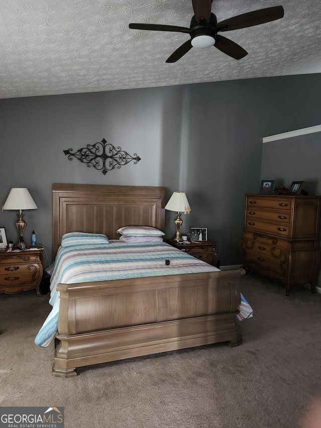 979 Simonton Dr, Lawrenceville, GA 30045 - bedroom featuring carpet, a textured ceiling, and ceiling fan