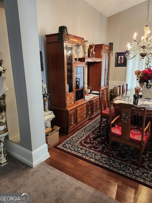 979 Simonton Dr, Lawrenceville, GA 30045 - carpeted home office featuring a chandelier and wood finished floors