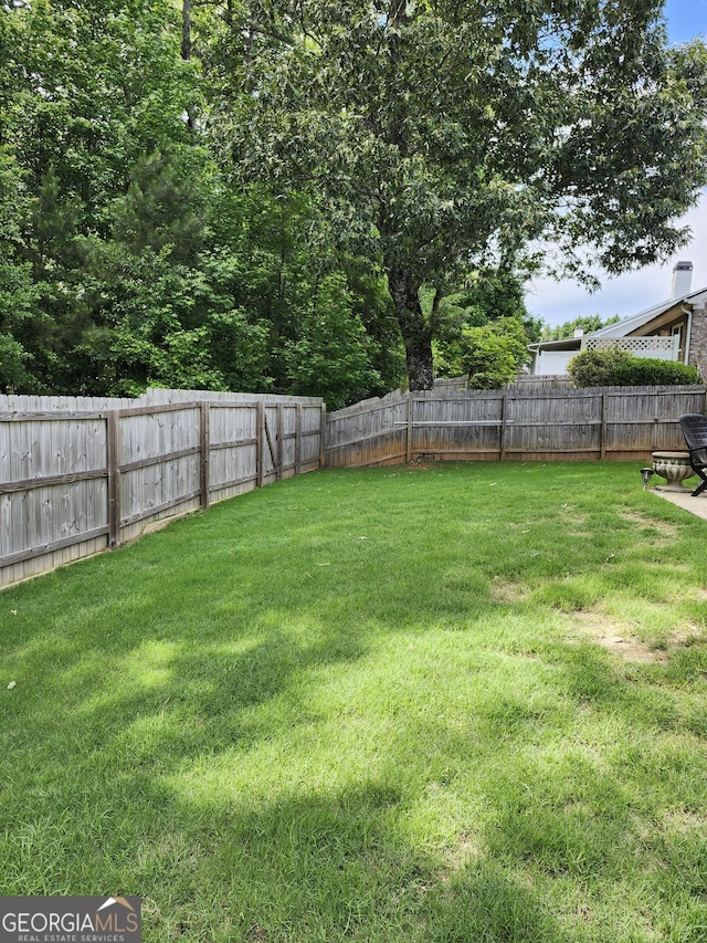 979 Simonton Dr, Lawrenceville, GA 30045 - view of fenced backyard