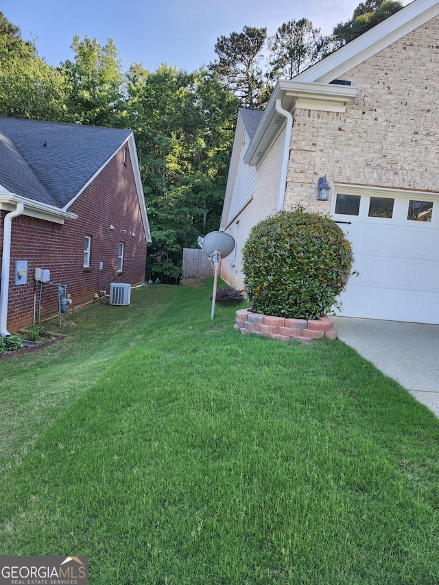 979 Simonton Dr, Lawrenceville, GA 30045 - view of home's exterior featuring brick siding and a yard