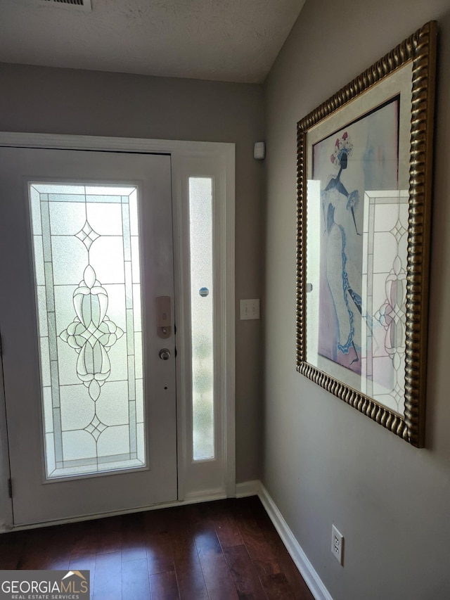 979 Simonton Dr, Lawrenceville, GA 30045 - foyer with baseboards and dark wood-style flooring