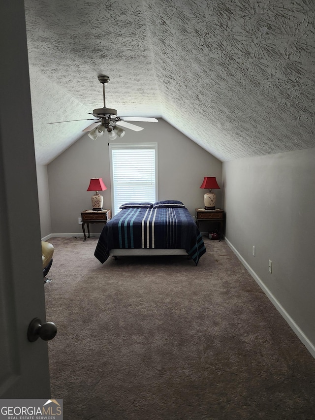 979 Simonton Dr, Lawrenceville, GA 30045 - carpeted bedroom with a textured ceiling, lofted ceiling, and a ceiling fan