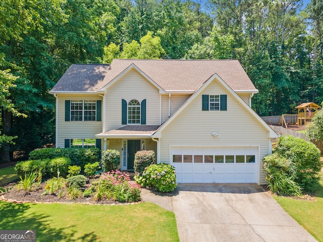 5340 Harris Creek Dr, Cumming, GA 30040 - traditional-style home with driveway, a front lawn, roof with shingles, and an attached garage