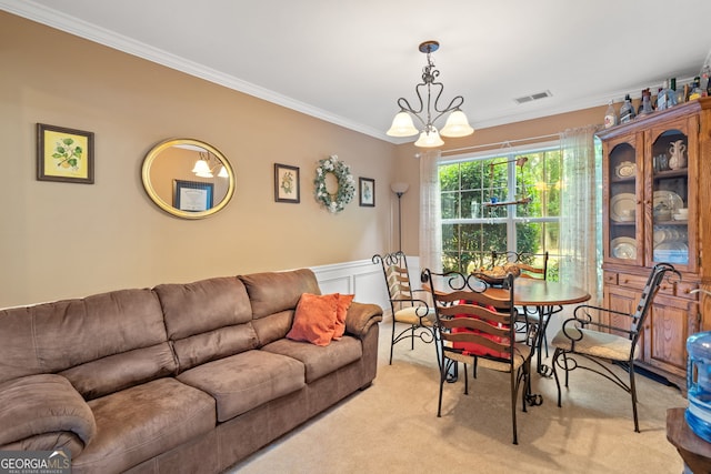 5340 Harris Creek Dr, Cumming, GA 30040 - dining area featuring crown molding, a chandelier, light colored carpet, a wainscoted wall, and a decorative wall