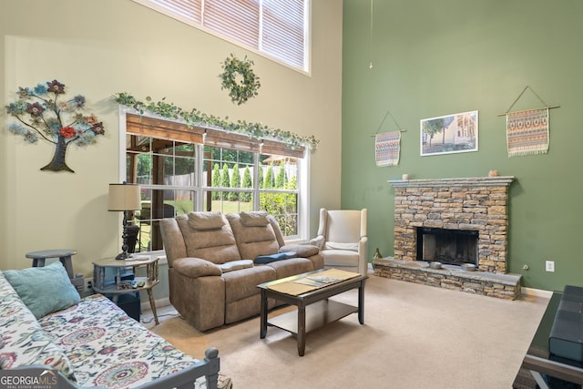 5340 Harris Creek Dr, Cumming, GA 30040 - carpeted living area featuring a high ceiling and a fireplace